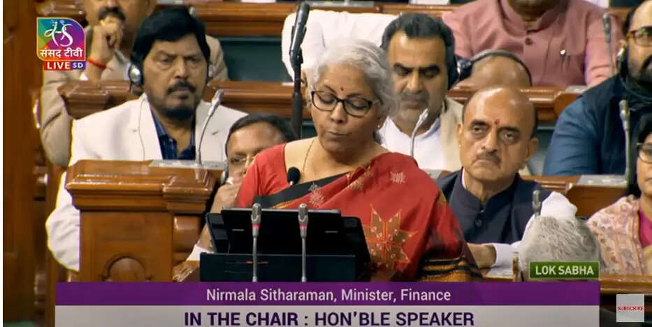 budget 2023 live : वित्त मंत्री निर्मला सीतारमण केंद्रीय बजट 2023-24 पेश कर रही हैं। यह मोदी सरकार के दूसरे कार्यकाल का आखिरी पूर्ण बजट है। इस बजट में सरकार की ओर से बड़ी घोषणाएं किए जाने की उम्मीद है। 8 साल से जिसका इंतजार था, वो उम्मीद पूरी हो गई। 7 लाख तक की इनकम पर अब कोई टैक्स नहीं लगेगा। वित्त मंत्री निर्मला सीतारमण ने कहा कि यह मिडिल क्लास के लिए सबसे अहम चीज है। इनकम टैक्स की स्लैब भी घटा दी गई हैं। इन्हें अब 6 से 5 कर दिया गया है। budget 2023 | budget 2023 date | budget live budget | union budget 2023 | economic survey 2023 | budget 2023 live | nirmala sitharaman | budget highlights live | budget 2023 | budget 2023 highlights | india budget 2023 | economic survey | finance minister of india | union budget | union budget 2023 date | budget live updates | budget highlights 2023 | arun jaitley | union budget 2023 live | india budget 2023 date | budget 2023 india live | health minister of india